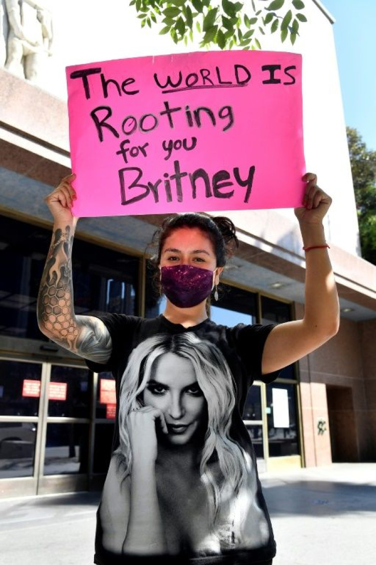 A supporter of Britney Spears gathers with others outside an LA courthouse for a #FreeBritney protest concerning her father's control over her personal and professional matters