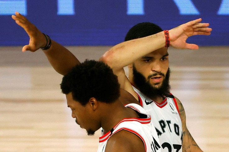 Toronto's Fred VanVleet celebrates a basket with teammate Kyle Lowry in the Raptors' 104-99 NBA playoff victory over the Brooklyn Nets