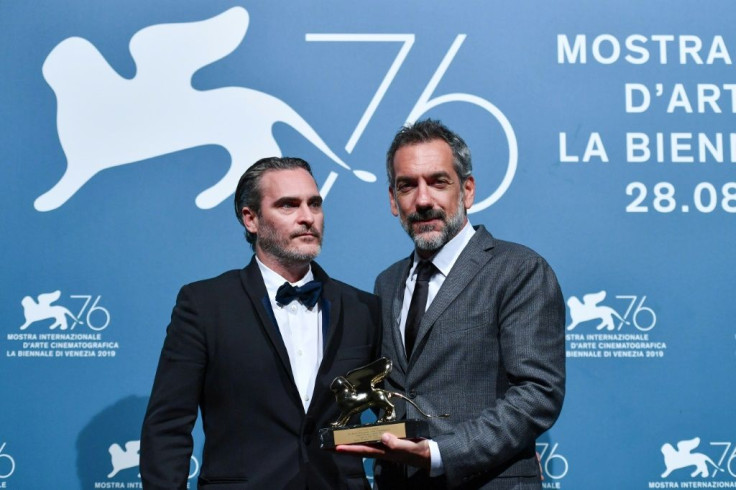 America director Todd Phillips and Joaquin Phoenix collect the Golden Lion award for 'Joker' which was voted Best Film at the 2019 Venice Film Festival