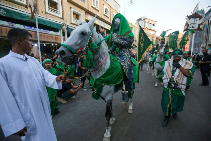 Worshippers re-enacted the martyrdom of Imam Hussein in Karbala despite the coronavirus pandemic