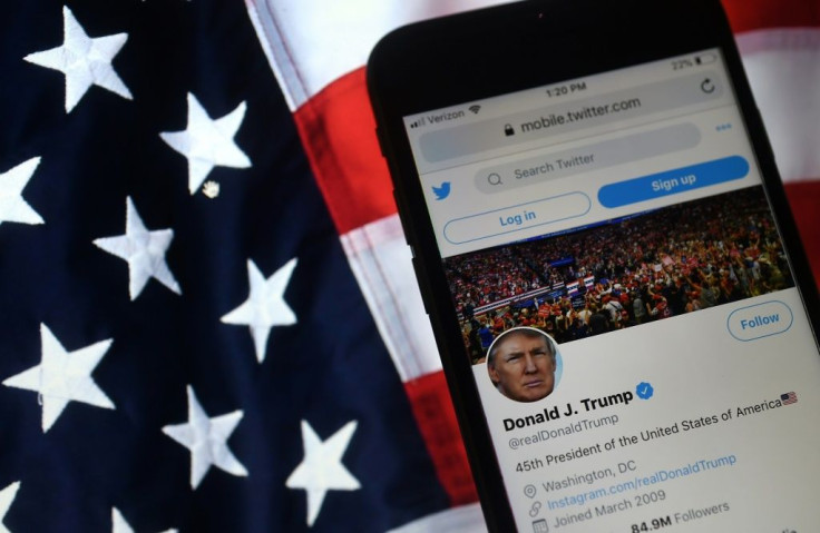 Twitter has removed or labeled several tweets by President Donald Trump, whose account is shown on a mobile phone in this photo illustration