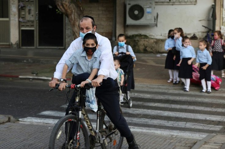 Israel has begen "a nightly closure" of 40 cities and towns with the highest infection rates