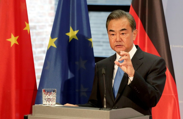 Chinese Foreign Minister Wang Yi (pictured in Berlin) has been touring European capitals over the summer seeking to drum up support in Beijing's spat with Washington