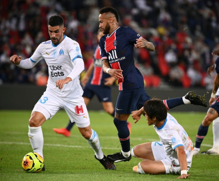 Neymar accused Marseille's Spanish defender Alvaro Gonzalez (L) of racism