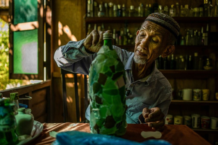 For the past 15 years, Tengku Mohamad Ali Mansor has made it his mission to collect bottles washed ashore on Malaysia's rugged South China Sea coast