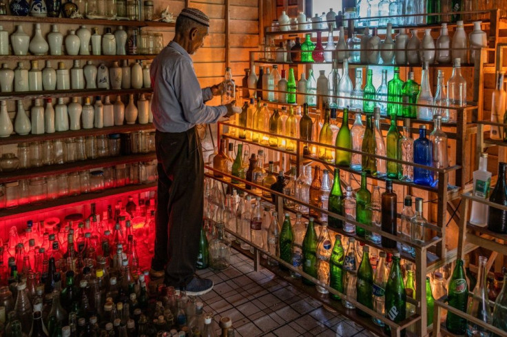 A 74-year-old Malaysian's quest to rid the country's beaches of washed-up glass led him to amassing a collection of thousands of bottles, now displayed in a colourful seaside museum
