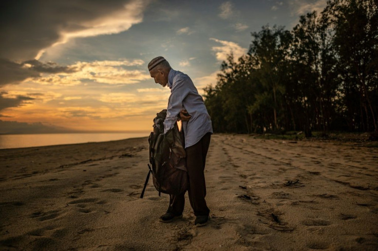 Tengku Mohamad Ali Mansor's obsession of collecting glass bottles on Malaysian beaches began in 2005, when he saw children blowing up empty bottles with fireworks