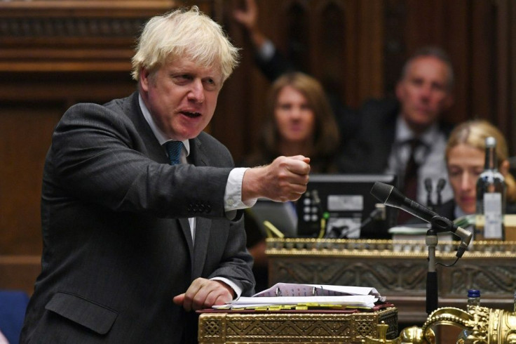 A handout photograph released by the UK Parliament shows Britain's Prime Minister Boris Johnson speaking during Prime Minister's Questions in the House of Commons in London on Wednesday.