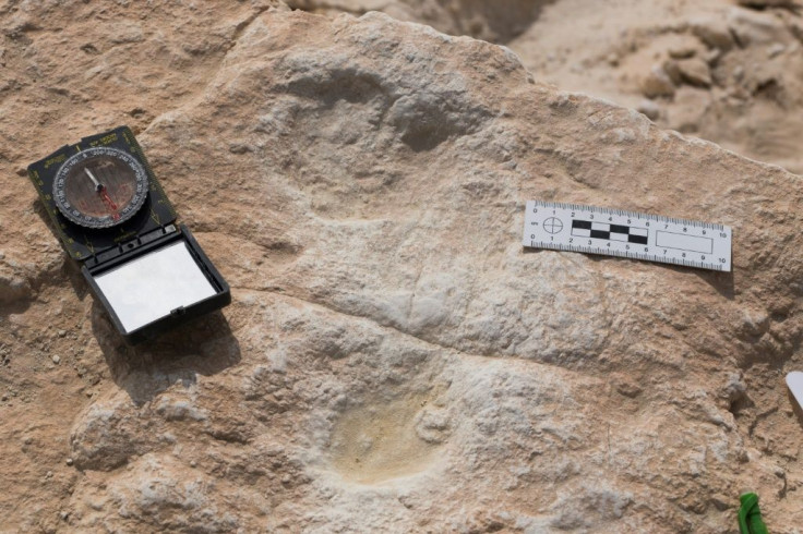 This undated handout photo obtained September 16, 2020 shows the first human footprint discovered at the Alathar ancient lake