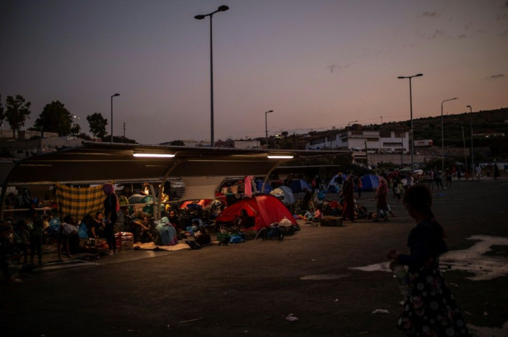 Thousands have been sleeping under tarpaulins or tents at roadsides and in the car parks of closed supermarkets since the fire