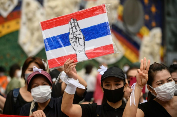 Activists rallied outside Shibuya station in Tokyo in support of the Bangkok protests