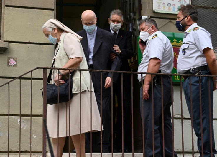 A nun leaves after casting her vote in Rome