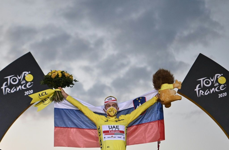 Tadej Pogacar celebrates his remarkable Tour de France triumph