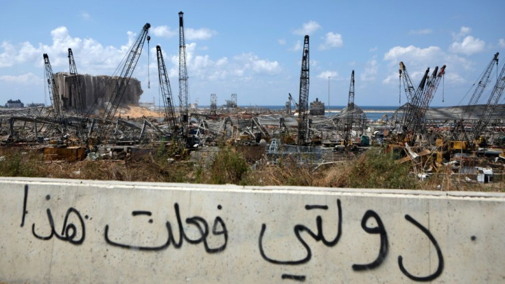 Graffiti reading 'my country did this' in Arabic was scrawled on a wall overlooking Beirut's port after the massive August 4 explosion that devastated the city