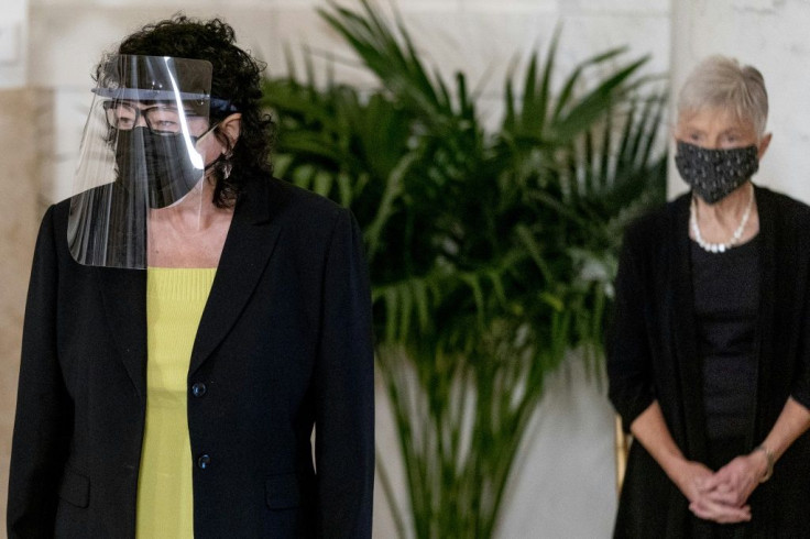 Justice Sonia Sotomayor (left) and Maureen Scalia, the wife of the late Justice Antonin Scalia, stand during a private ceremony for Justice Ruth Bader Ginsburg at the Supreme Court in Washington, DC, on September 23, 2020