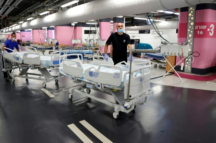 Technicians set up an overflow intensive care ward for coronavirus patients in the underground car park of the Rambam Health Care Campus in Israel's third largest city Haifa