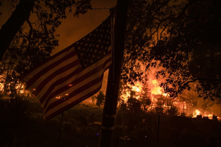 Buildings burn along Highway 12 as fire approaches Santa Rosa,  California on September 28, 2020