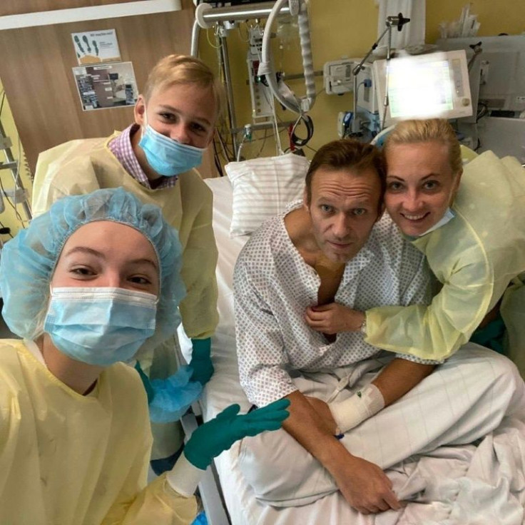 Navalny poses with his wife and children having emerged from a coma at Berlin's Charite hospital.