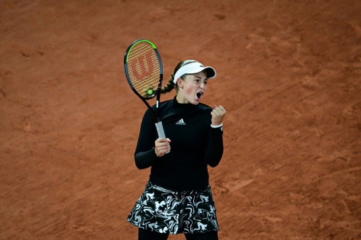 Back in business: Jelena Ostapenko celebrates after defeating Karolina Pliskova