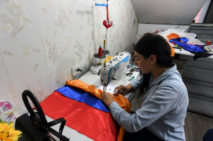 Workshops across the city are sewing more flags