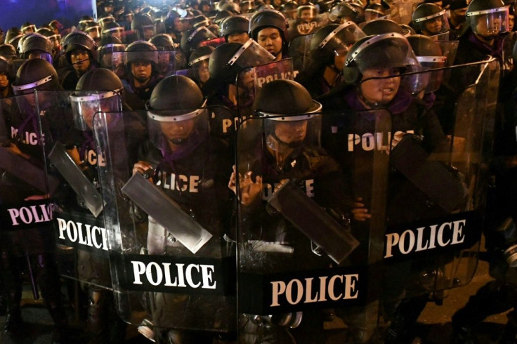 Riot police dispersed pro-democracy protesters in Bangkok