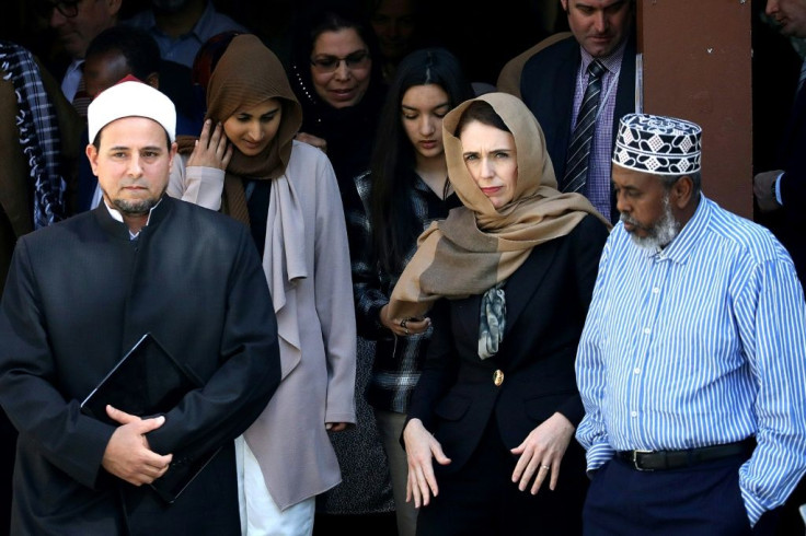 Jacinda Ardern walks with Al Noor mosque Iman Gamal Fouda ahead of unveiling a plaque in memory of the victims killed in the 2019 shootings