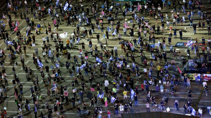 Israeli protesters took the streets on Saturday in demonstrations against Prime Minister Benjamin Netanyahu