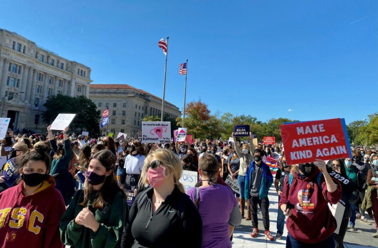 Most marchers in Washington wore protective masks for the women's rally against Trump