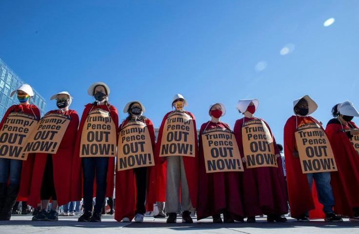 Some protesters came to the march in Washington dressed as characters from the dystopian novel and television series "The Handmaid's Tale," who are forced to bear children