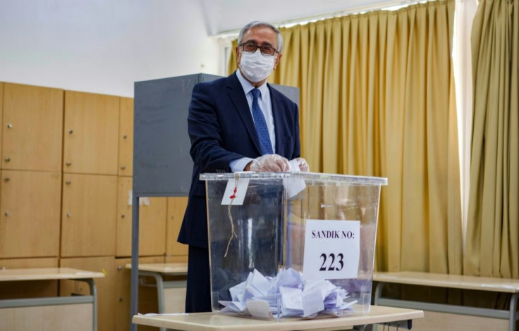 Turkish-Cypriot leader Mustafa Akinci, a pro-reunification moderate, faces a challenge from Ankara-backed Ersin Tatar in the vote in breakaway northern Cyprus