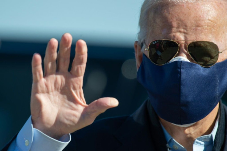 Joe Biden boards a plane in Delaware for a campaign day trip to Durham, North Carolina