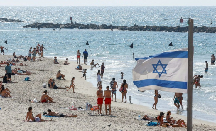 The beach in the Israeli coastal city of Tel Aviv reopened on Sunday as new infection numbers receded