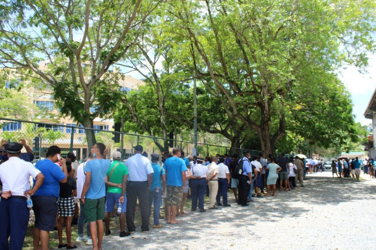 Seychelles voters prepare to cast ballots at the English River polling station in Victoria, kicking off three days of voting