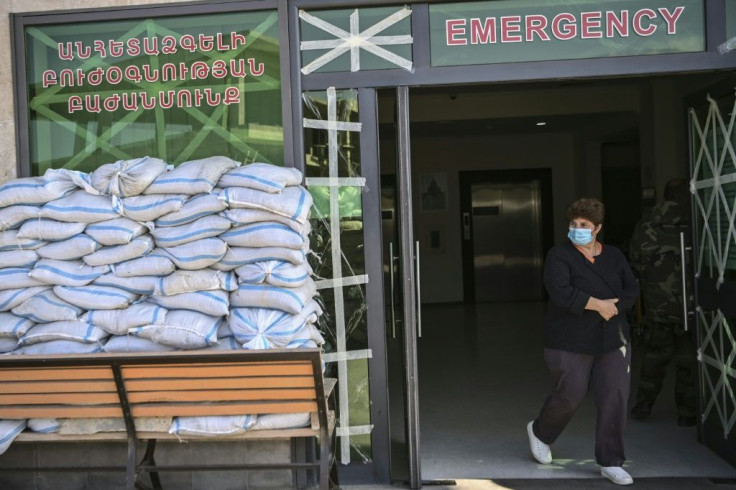 The entrance to the hospital is piled high with sandbags