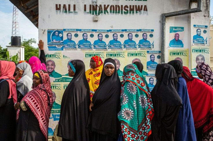 Women queue separately to vote at a polling station in Mtoni, Zanzibar