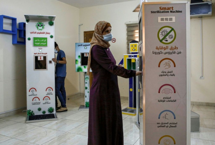 Palestinian entrepreneur Heba al-Hindi demonstrates a locally-designed and manufactured sterilisation device in Gaza City