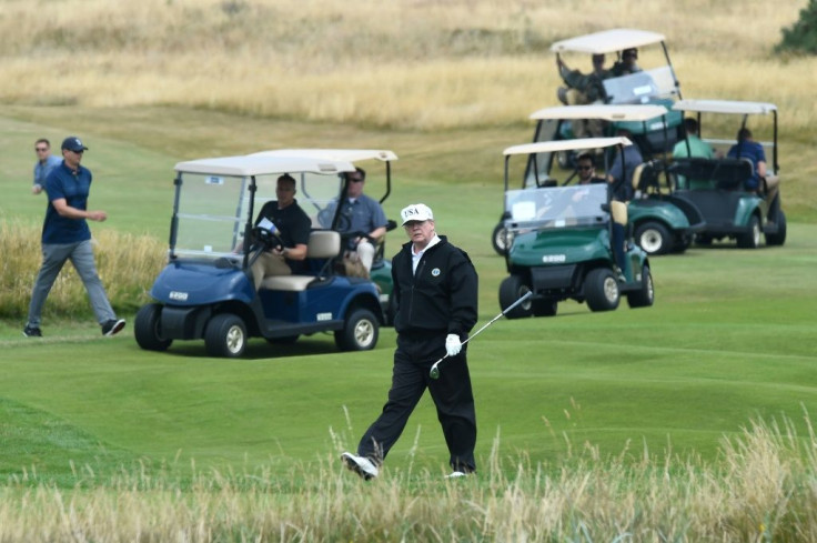 Trump, seen playing a round of golf at his Trump Turnberry luxury resort in July 2018, reputedly made Milne an offer of cash, jewellery and a golf club membership for his house, but was turned down