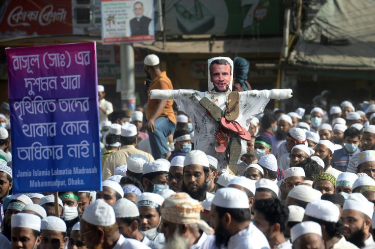Muslim worshippers came out of Friday prayers in mosques across the Bangladeshi capital and some burned an effigy of French President Emmanuel Macron