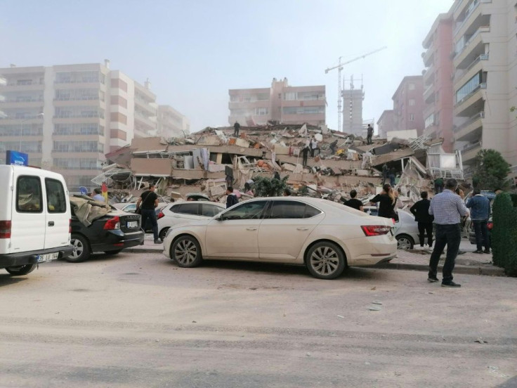 Images from Izmir showed collapsed buildings and dazed people trying to make their way through rubbled piled high on the streets