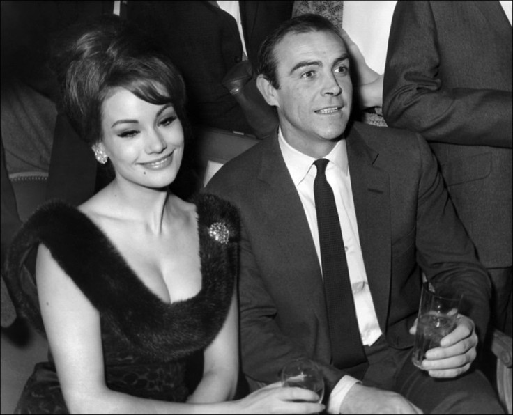 In this file photo taken on February 19, 1965 Scottish actor Sean Conner (R) and his partner Claudine Auger (L) answer journalists' questions in Paris.
