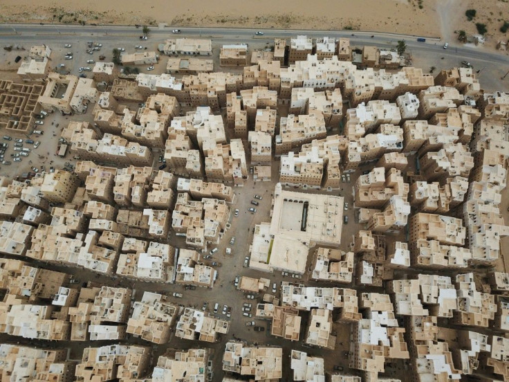 The traditional mud-brick architecture of Yemen's Hadramawt region is well suited to the climate but needs constant repairs -- this photograph is of Sayf village
