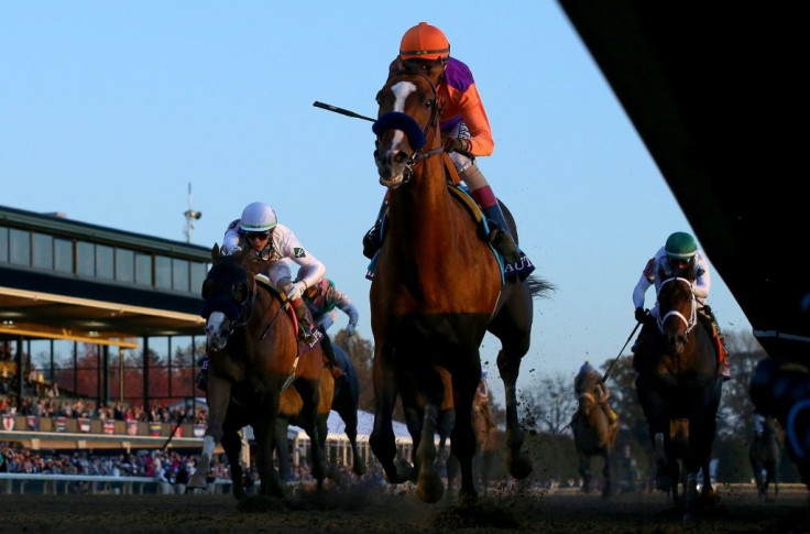 Authentic, with John Velazquez aboard, wins the Breeders' Cup Classic at Keeneland in Lexington, Kentucky