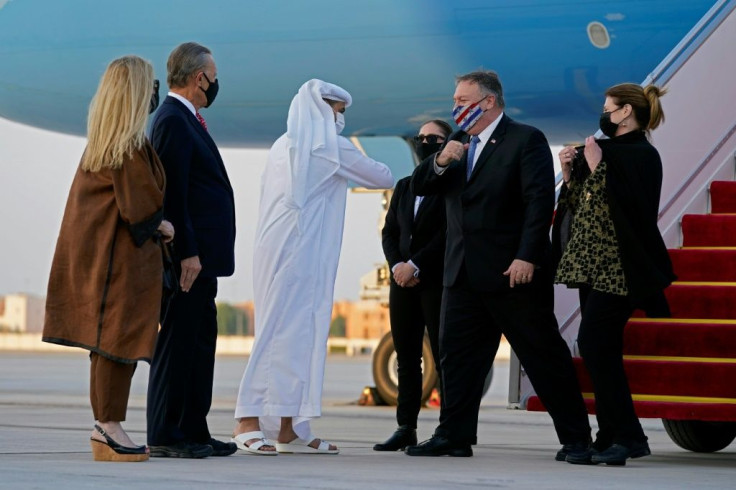 US Secretary of State Mike Pompeo and his wife Susan arrive in Abu Dhabi on a trip that will take him to see Taliban representatives in Qatar