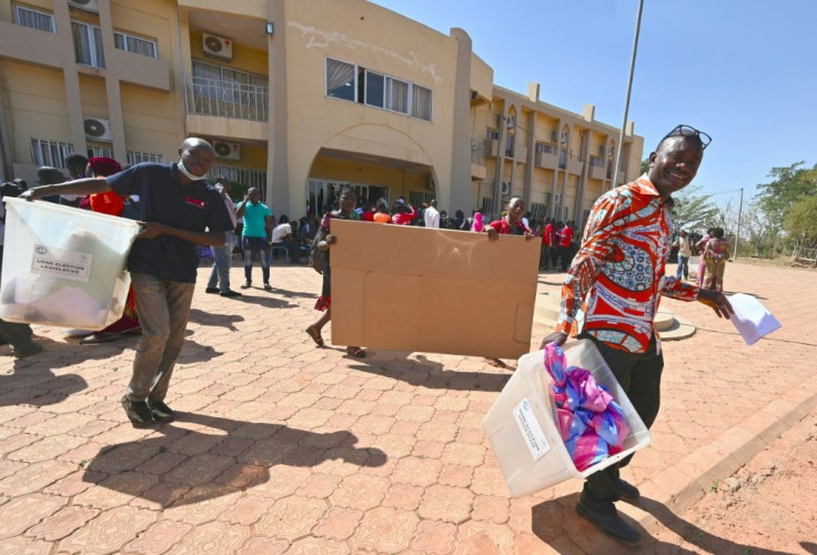 Election workers heading for a polling station in Ouagadougou on Saturday to set up the ballot boxes