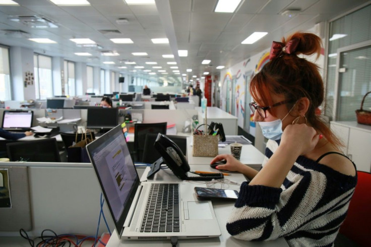 An employee of Kaspi, Kazakhstan's payment systems and e-commerce leader, at the London-listed company's HQ in the capital Almaty