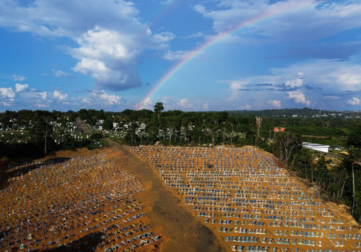 Aerial view of the burial site reserved for victims of the Covid pandemic with a rainbow in the sky at the Nossa Senhora Aparecida cemetery in Manaus, in the Amazon forest in Brazil
