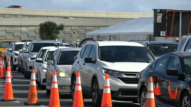 IMAGESCars line up at a drive-through Covid-19 testing site in Miami, Florida as cases of the coronavirus continue to surge ahead of the Thanksgiving holiday.