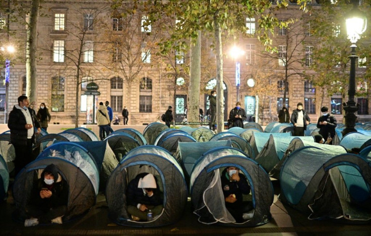 Volunteers had helped set up around 500 blue tents at the Place de la Republique in the heart of the French capital late Monday
