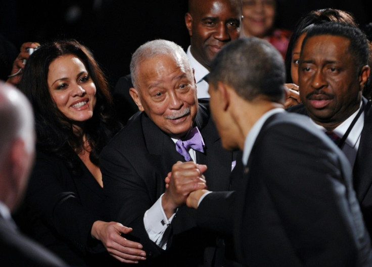 New York City's first Black mayor David Dinkins greets US President Barack Obama in 2011