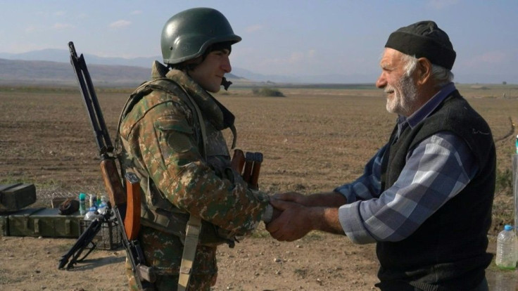 Nagorno-Karabakh: Armenian villagers and soldiers adjust to new border